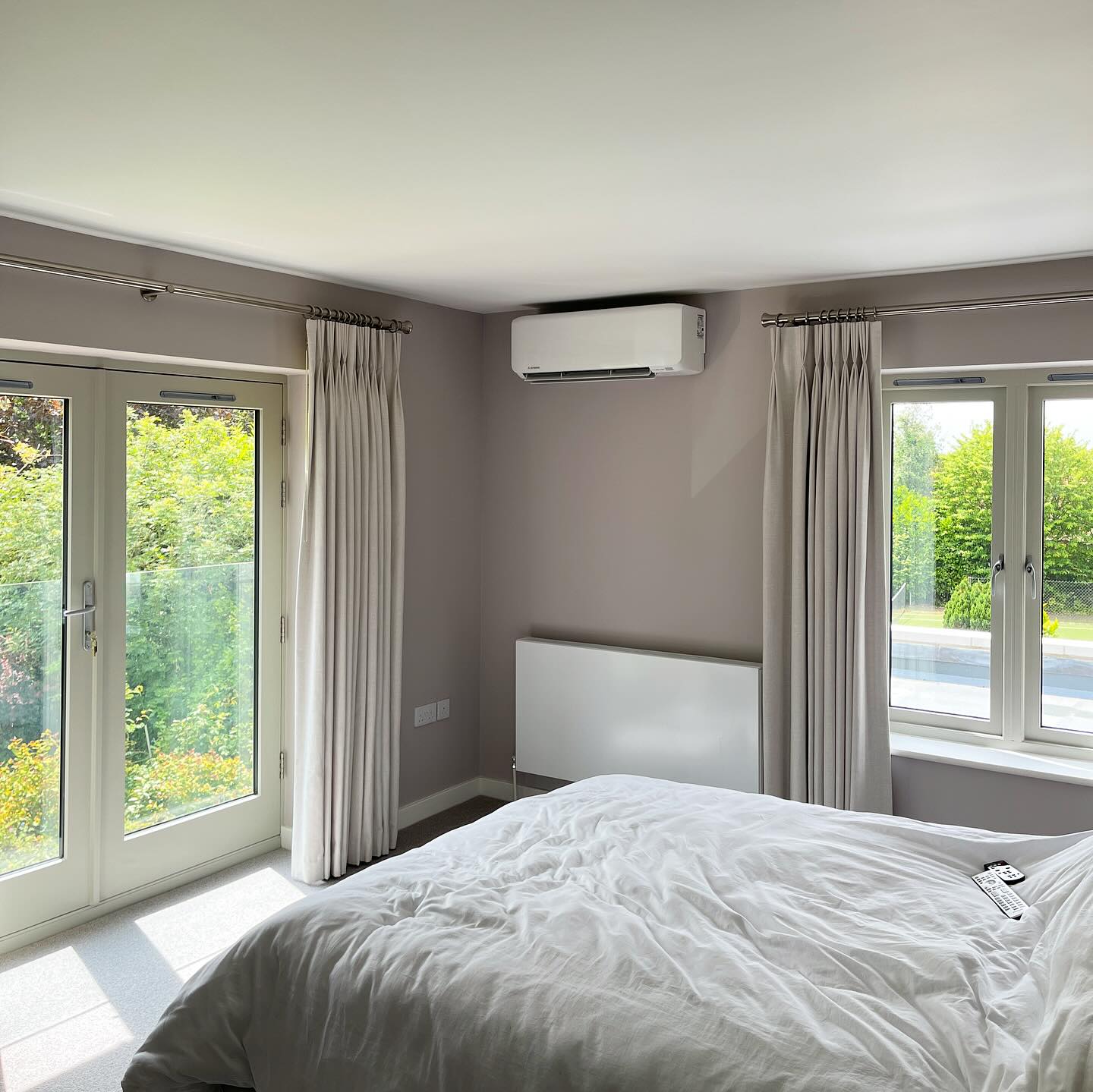 Mitsubishi wall-mounted air conditioning unit in Leeds bedroom